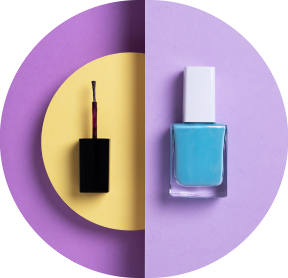 vertical-overhead-shot-blue-nail-polish-black-applicator-geometric-yellow-purple-background 2